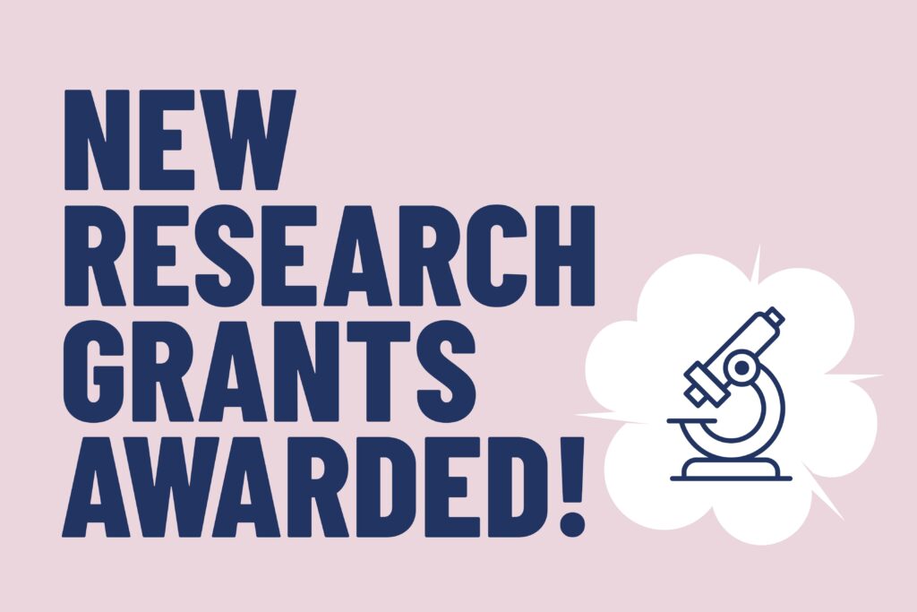 An illustrated graphic saying: "new research grants awarded!" with an illustration of a microscope.