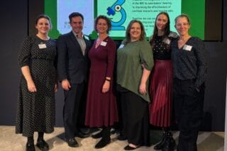 Staff from RNID and the BIA standing together Left to right, Sinead Donoghue (RNID), Steve Bates (BIA), Harriet Oppenheimer (RNID), Laura Bunn (RNID), Alina O'Keeffe (BIA), Jane Wall (BIA)