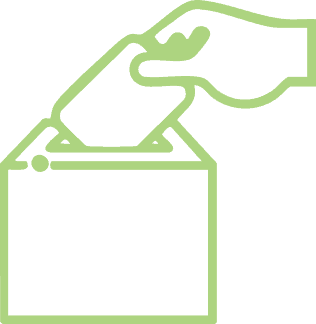 A hand putting ballot paper in the ballot box.