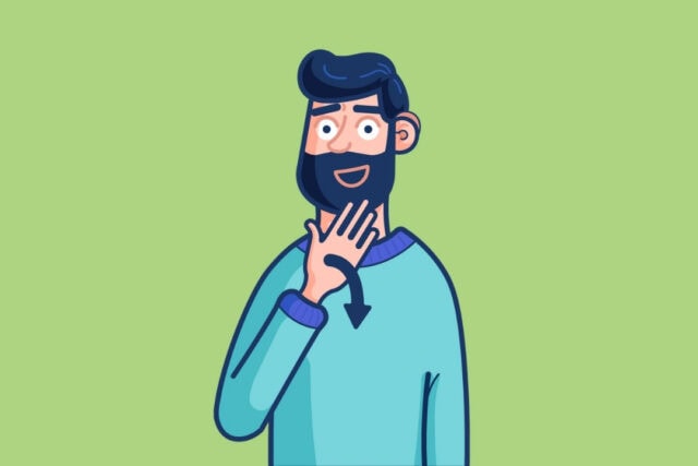 A man with a beard and wearing a blue jumper signs thank you.